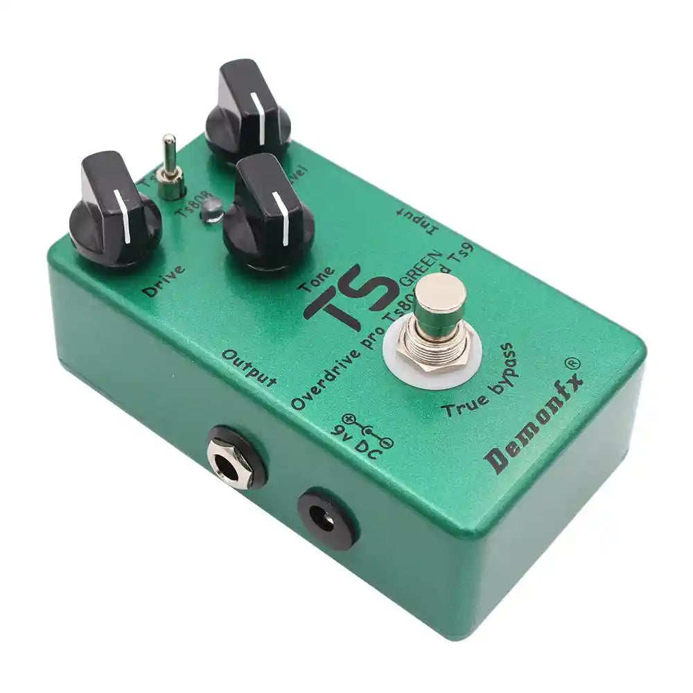 Demonfx TS GREEN dual overdrive booster pedal combining TS9 and TS808 features, with drive, tone, and level controls in a green metal casing.