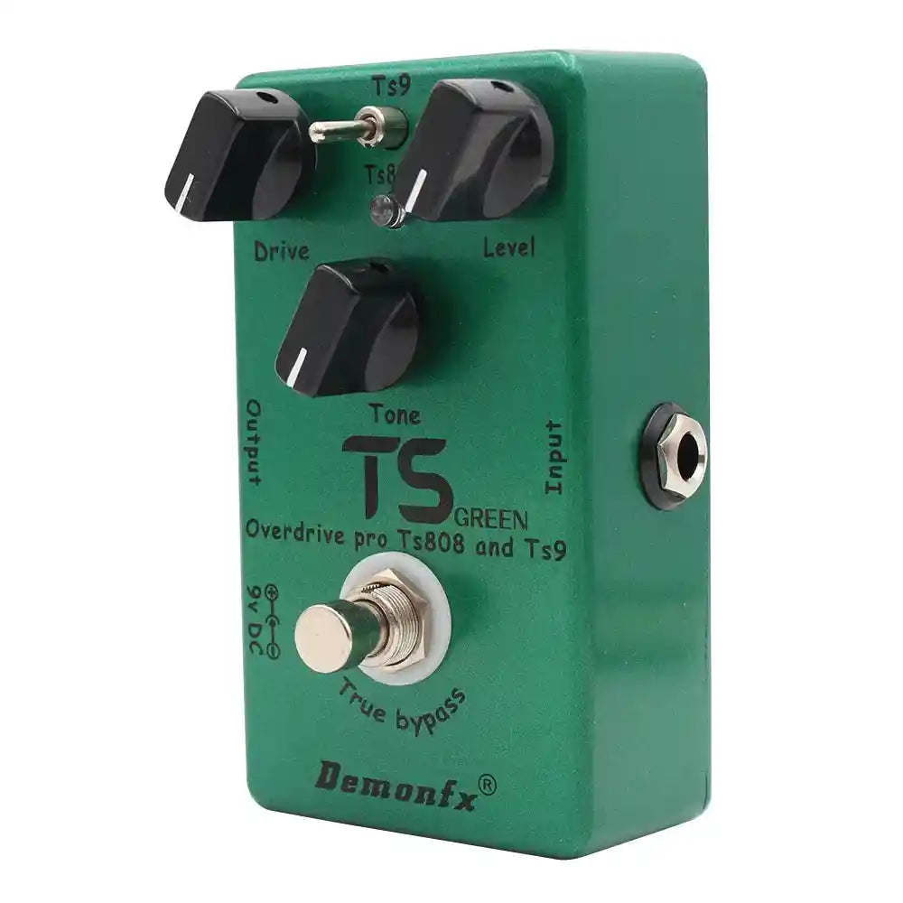 Demonfx TS GREEN dual overdrive booster pedal combining TS9 and TS808 features, with drive, tone, and level controls in a green metal casing.