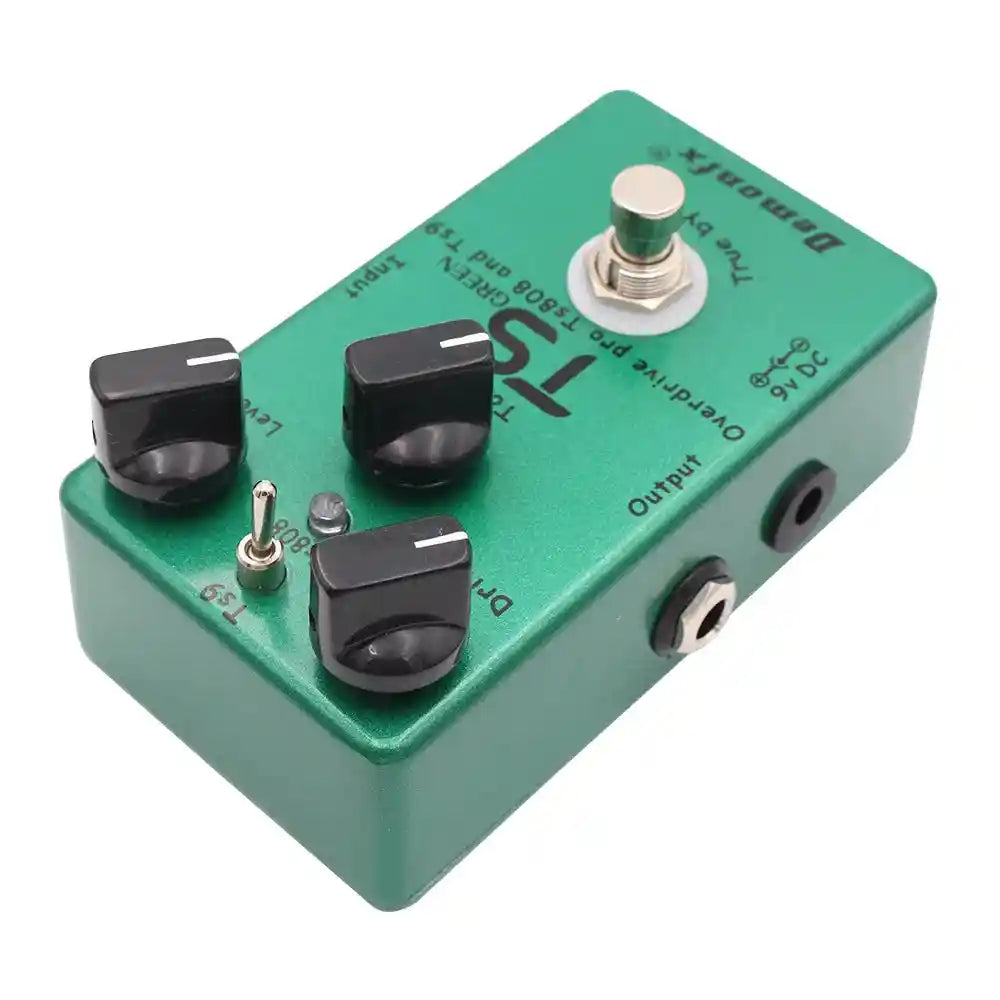 Demonfx TS GREEN dual overdrive booster pedal combining TS9 and TS808 features, with drive, tone, and level controls in a green metal casing.