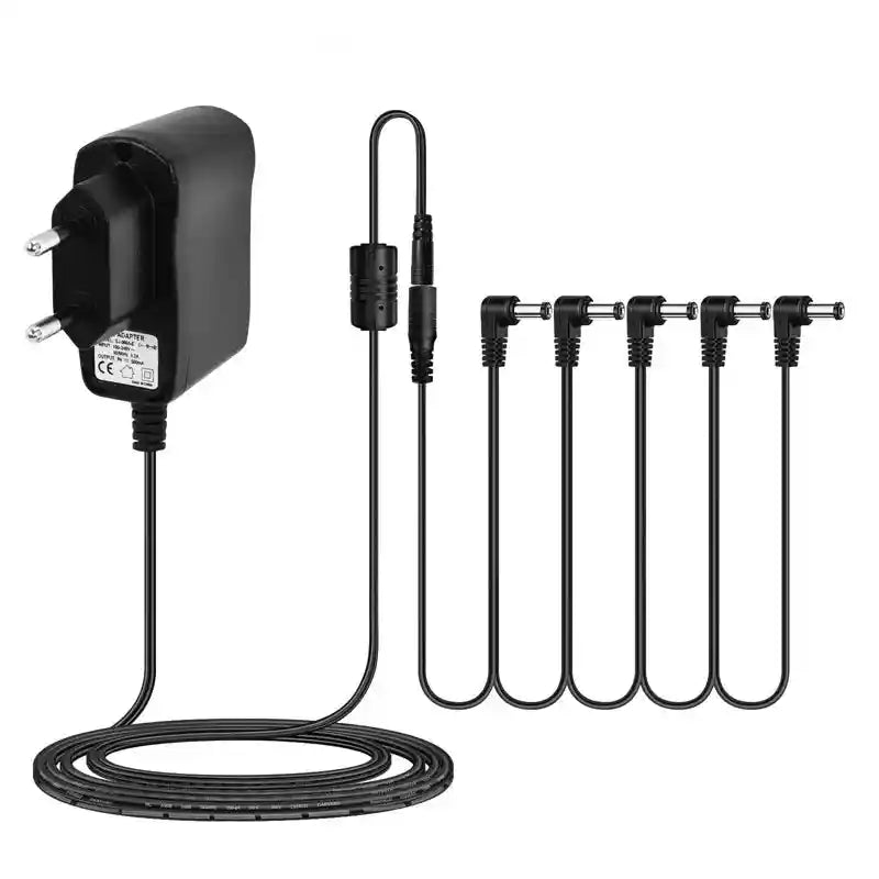 9V DC 500mA power supply with 5-way daisy chain cable, ideal for powering multiple guitar pedals simultaneously. Compact and efficient design for electric guitar pedalboards.