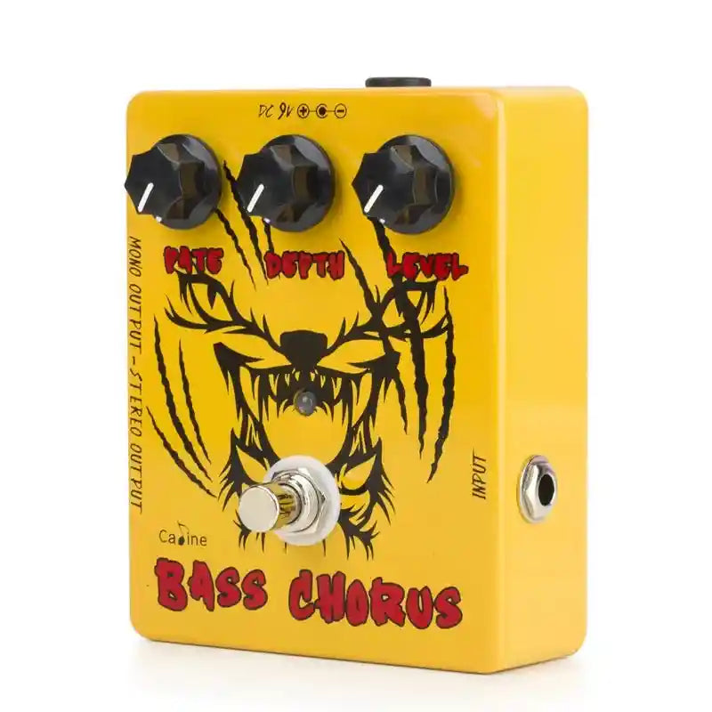 Caline CP-83 The Pumpkin Carver Bass Chorus pedal in yellow with black and red graphics, featuring Rate, Depth, and Level controls for sound customization.