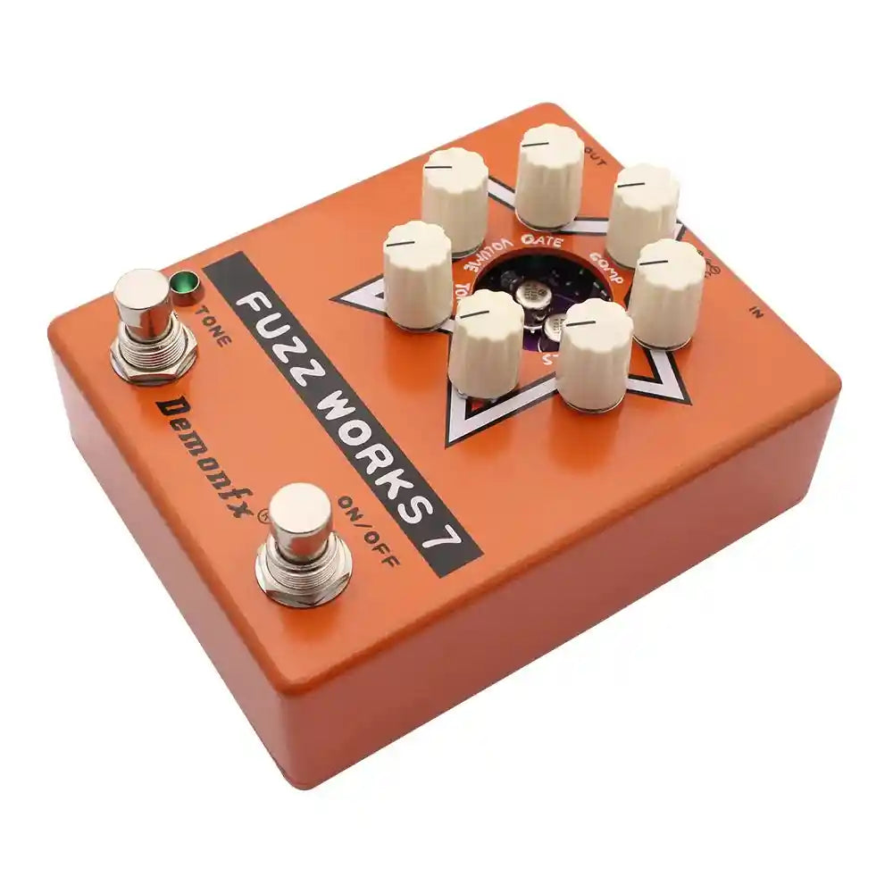 Demonfx Fuzz Works 7 vintage fuzz pedal in orange with tone, volume, and transistor controls for custom guitar and bass sounds.