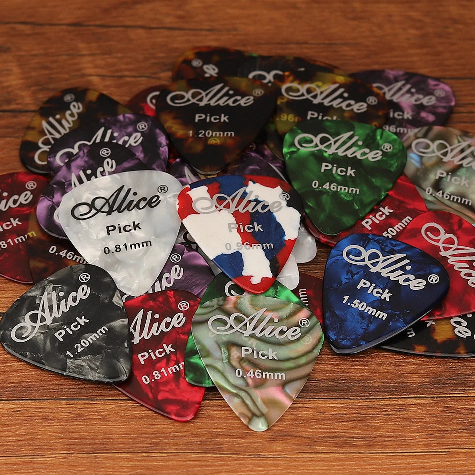 Alice Pearl Celluloid Picks Set featuring a transparent box with 100 colorful guitar picks in various thicknesses, ideal for acoustic and electric guitars.