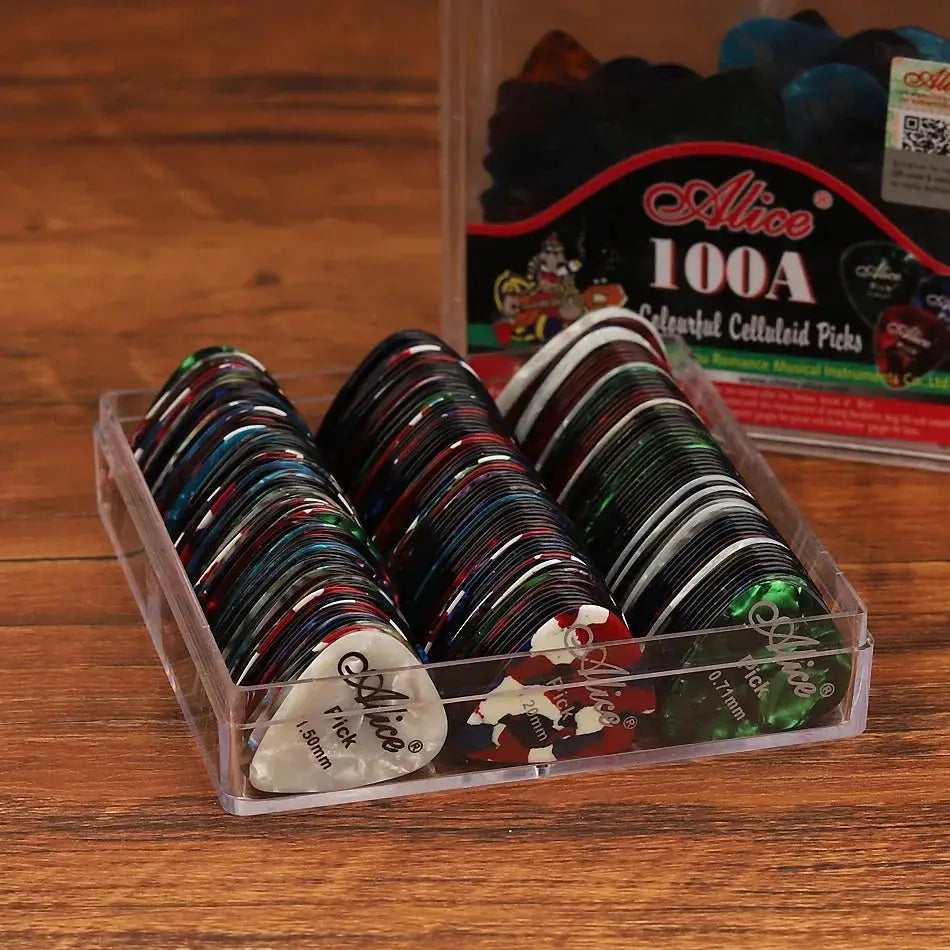 Alice Pearl Celluloid Picks Set featuring a transparent box with 100 colorful guitar picks in various thicknesses, ideal for acoustic and electric guitars.