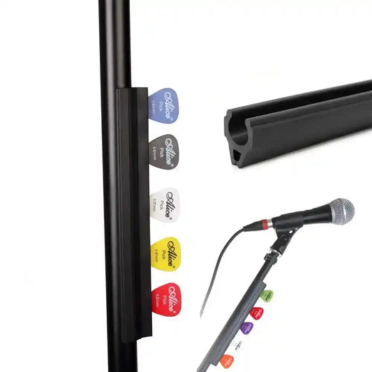 Rubber guitar pick holder clip attached to a live microphone stand, holding multiple colorful guitar picks for easy access during performances.