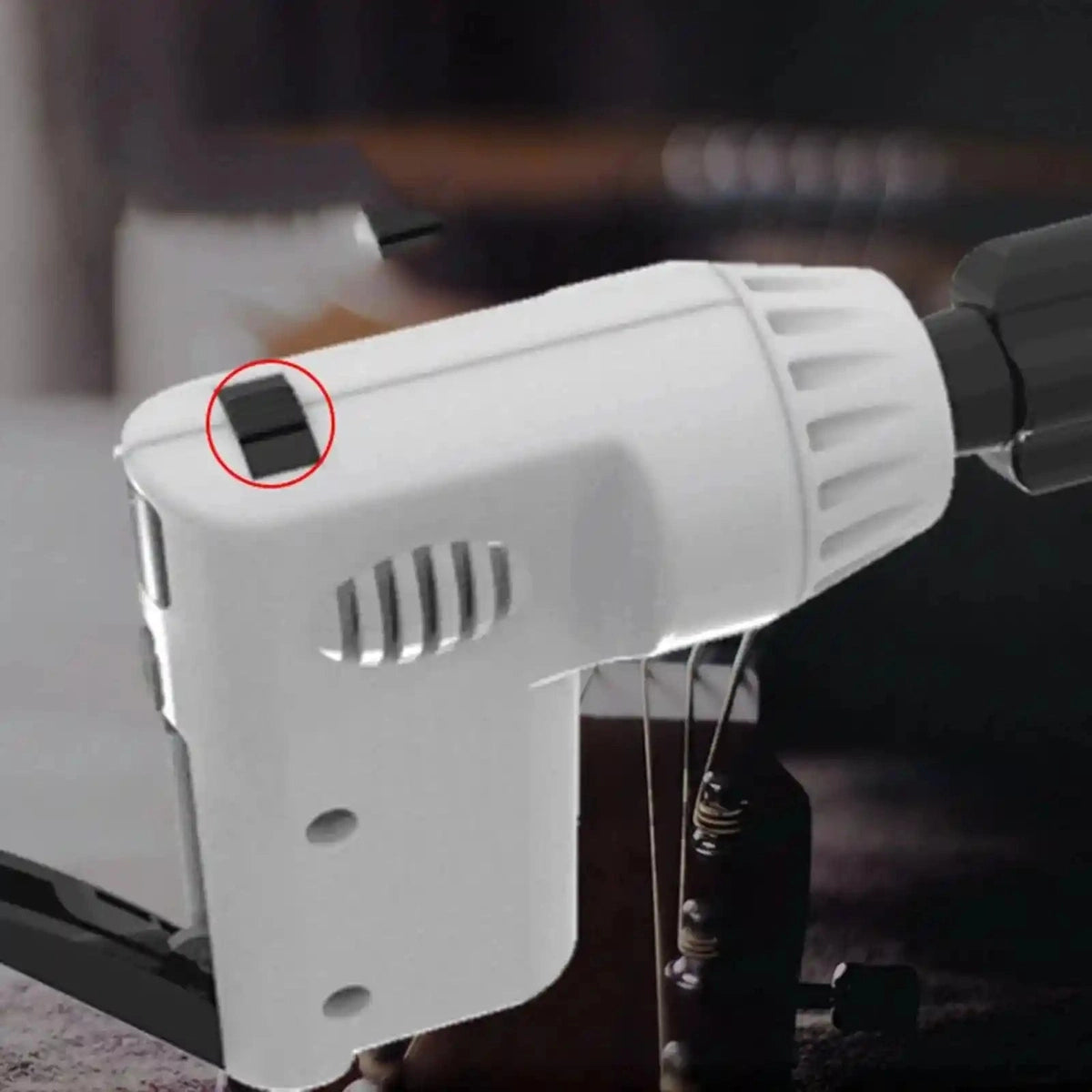 Electric String Winder with String Cutter.