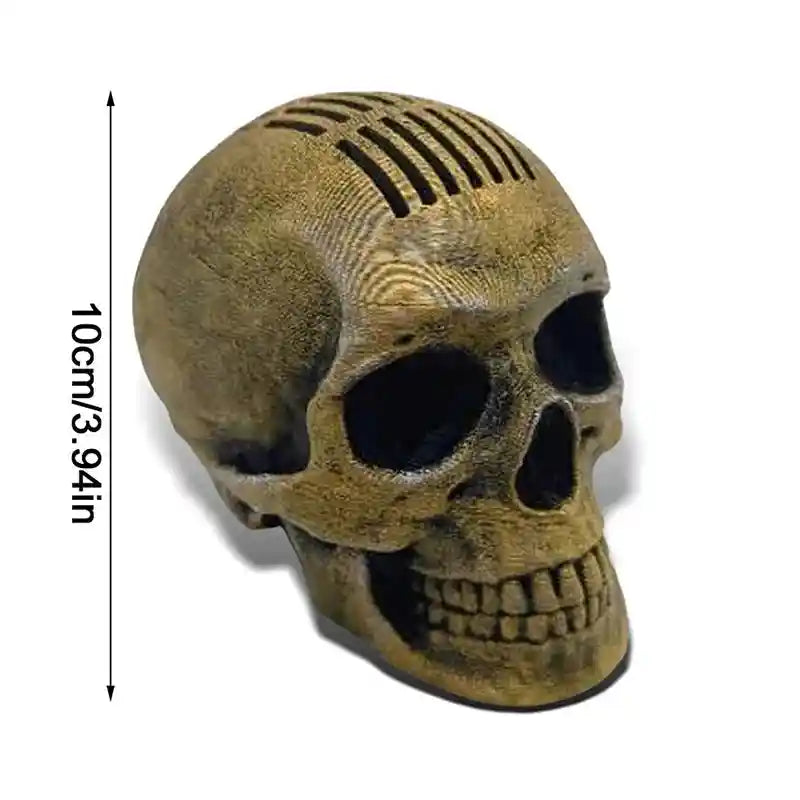 Skull guitar pick holder with a realistic Gothic skull design featuring a Mohawk-style pick storage for 21 picks, measuring 10cm/3.94in.
